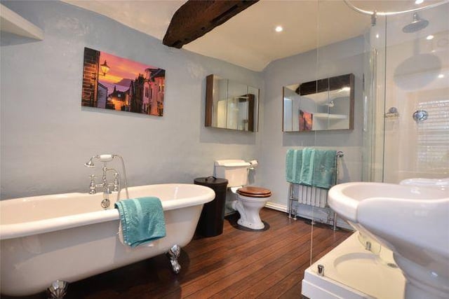 The house features a large and modern family bathroom