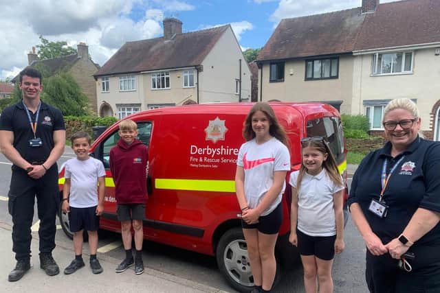 Officers from Emergency Services have visited Dunston Primary & Nursery Academy in Chesterfield to discuss fire safety with the pupils. From the left: Matt Thompson, Derbyshire Fire & Rescue Officers, Redd South,11, Joshua Moore,11, Neve Crowder, 11, Alexia Ryan, 10 and Adele Chapman-Jones, community safety officer with Derbyshire Fire & Rescue Services.
