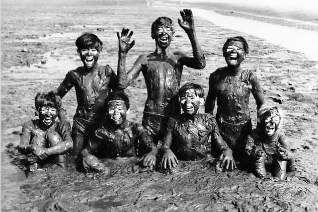 Mudlarks in Skegness for these young holidaymakers.