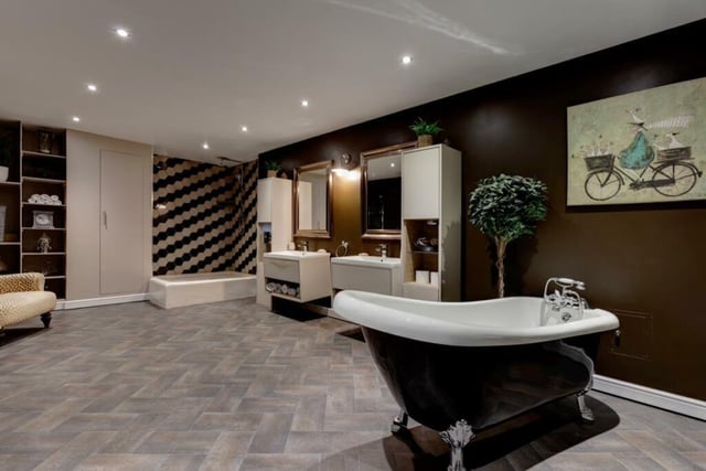 A roll top bath, corner wet room style shower area, two wash basins and a wc are housed in the  bathroom on the ground floor. There is a shower room on the first floor and an ensuite serving the master bedroom