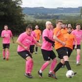 Action from Pilsley Community (tangerine) v New Whittington Newbold in HKL ONE. Photos by Martin Roberts.