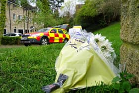 Flowers left at the scene of the tragic fire