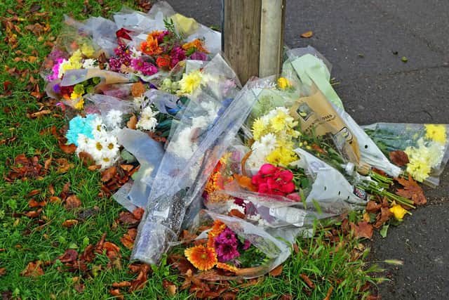 Flowers have been left at the scene of an alleged murder on Somercotes Hill at Somercotes. People who knew the alleged victim described him as 'lovely' and 'always smiling'.