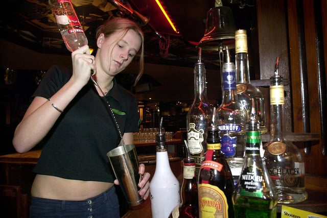 Trainee Manager at Brannigans Stacey Tweedale mixes a cocktail, 2002