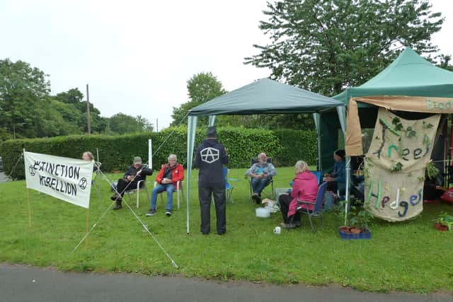 Extinction Rebellion campaigners say there has been 'little action' since North East Derbyshire District Council declared a climate change 'emergency'.