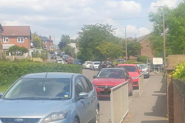 Parents are concerned the removal of the bus service will cause additional parking issues outside Town End Junior School on Alfreton Road, which they say is already problematic and dangerous. Pictured are cars parked outside the school.