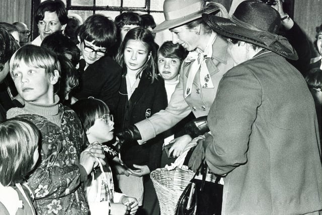 Princess Anne chats to children on a visit to Tansley, Derbyshire in June 1978