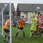 Action from the HKL Division One clash between Bridge Inn (tangerine) and Boythorpe. Photos by Martin Roberts.