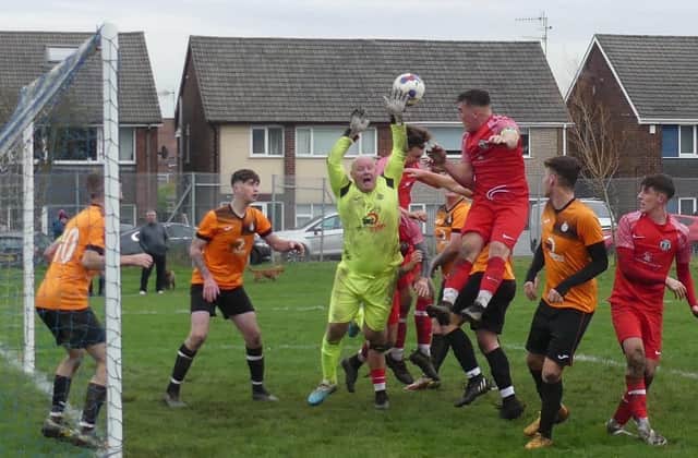Action from the HKL Division One clash between Bridge Inn (tangerine) and Boythorpe. Photos by Martin Roberts.