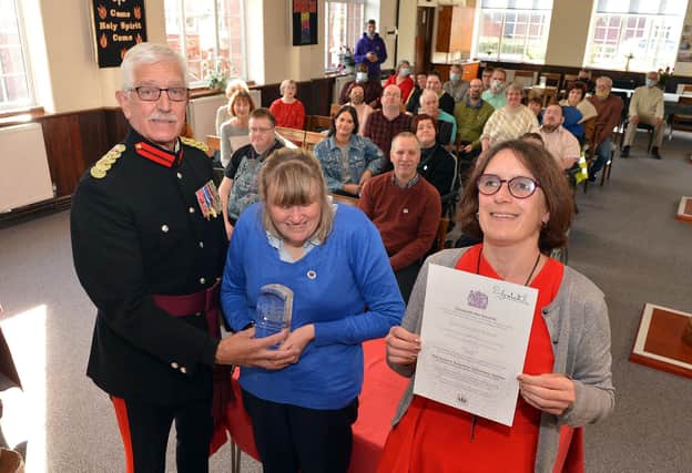 Colonel John Wilson OBE DL, Vice Lord-Lieutenant Derbyshire, presents The Queen's Award for Voluntary Service to Maria Britland and Emma Kellett.