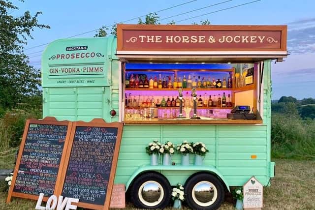 The mobile bar is housed in an old horse box.