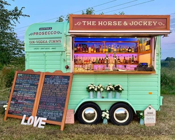 The mobile bar is housed in an old horse box.