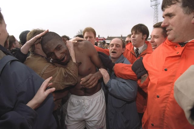 Chesterfield celebrate their 1-0 victory over Wrexham in the FA Cup quarter final in 1997.
