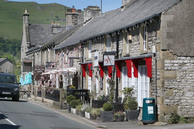 Castleton's Cross street, known for its many shops, tearooms and pubs.