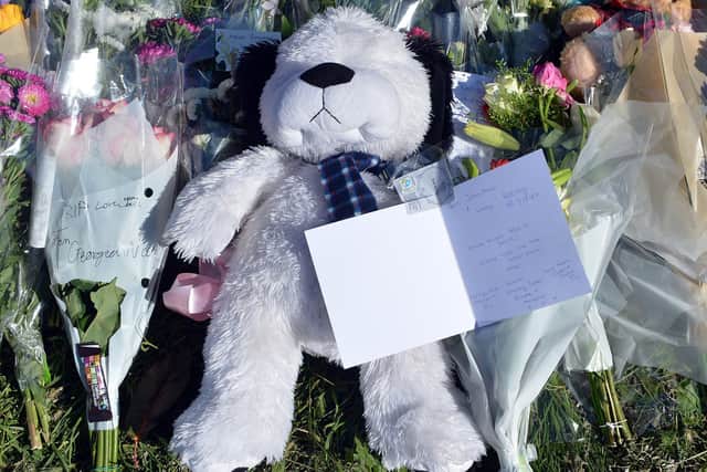 Tributes left at the scene of the quadruple murder on Chandos Crescent, Killamarsh