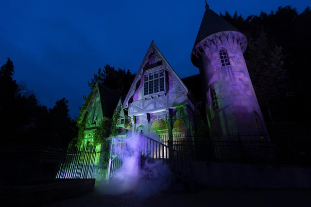 An eerie glow surrounds the exterior of spine-tingling new attraction The Curse at Alton Manor  (photo: David Parry/PA Wire).
