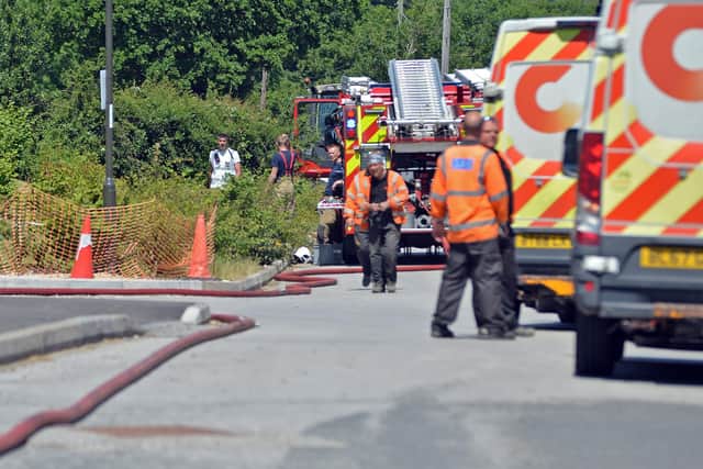 Firefighters seen at a ruptured gas main on Brackenfield Lane in Wessington.