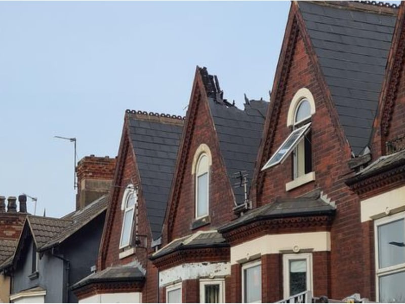 The flames spread to adjoining properties through the roof void.