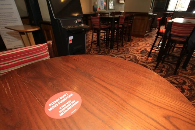 In order to keep tables a safe distance apart customers are asked not to move the furniture. Picture: Chris Etchells
