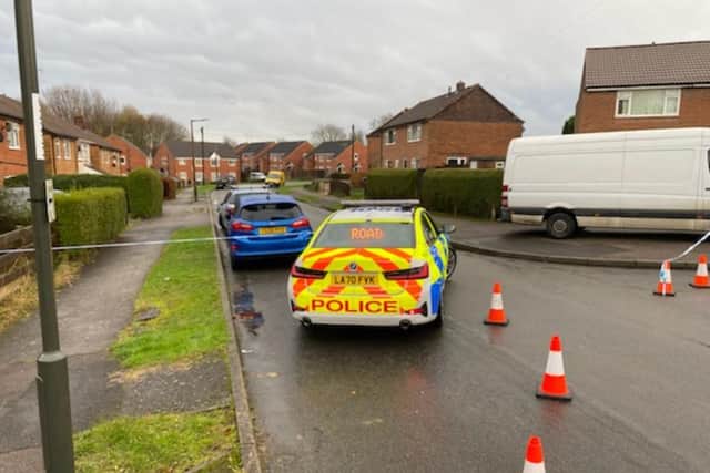 Derbyshire police on Shakespeare Street in Holmewood earlier today (December 6)