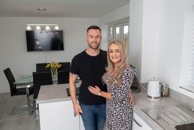 Faye and Rob in their kitchen at the Ashberry Homes Cherry Meadow development in Hatton.