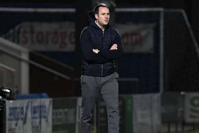 James Rowe on the touchline against Aldershot Town in his first game in charge.
