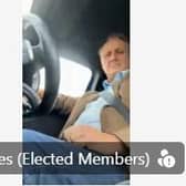 Alan Graves pictured driving his car while on a Derbyshire County Council meeting. Image from Derbyshire County Council.