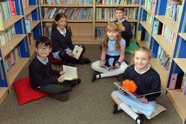 St Mary's school in Chesterfield is the most oversubscribed primary school in north Derbyshire for the 2021/22 academic year. Year 3 children are pictured reading in the library.
