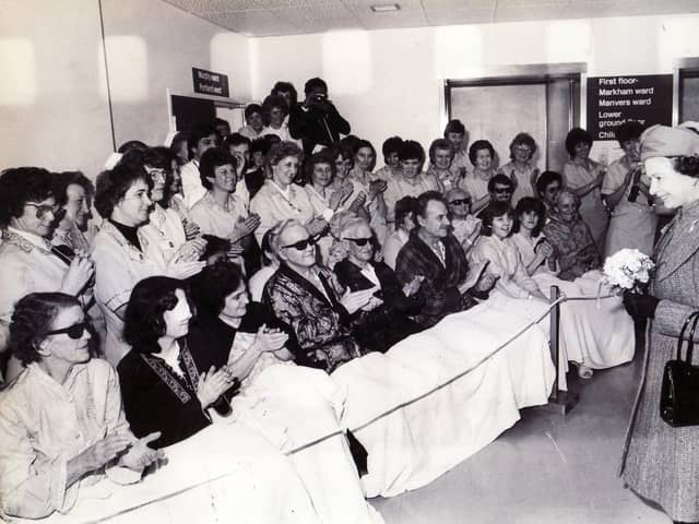 Queen Elizabeth II opens Chesterfield Royal Hospital on 15th March 1985. Here The Queen stops to talk to some of the patients and staff during her tour.
