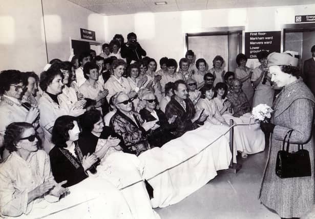 Queen Elizabeth II opens Chesterfield Royal Hospital on 15th March 1985. Here The Queen stops to talk to some of the patients and staff during her tour.