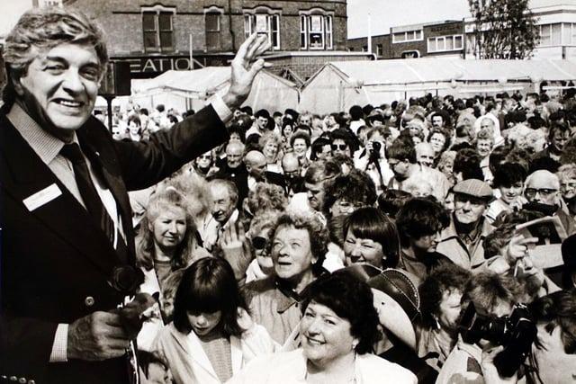 Singer Frankie Vaughan waves to the crowds as he opens Heanor Victorian Market back in May 1989.