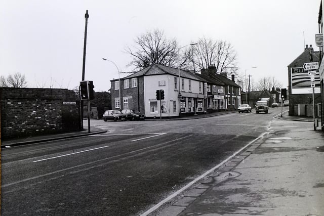 This is another part of Chatsworth Road that has been transformed since this photo was taken in 1989.
The wall on the left marks what was the JJ Blow factory, which made agricultural machinery. The site is now home to the Morrisons superstore, with traffic lights replaced by the roundabout we see today.