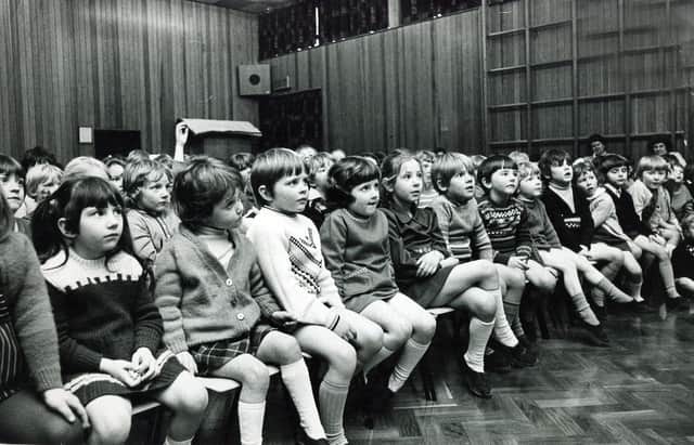 Assembly time for these Sheffield school children, but when and where was the picture taken?