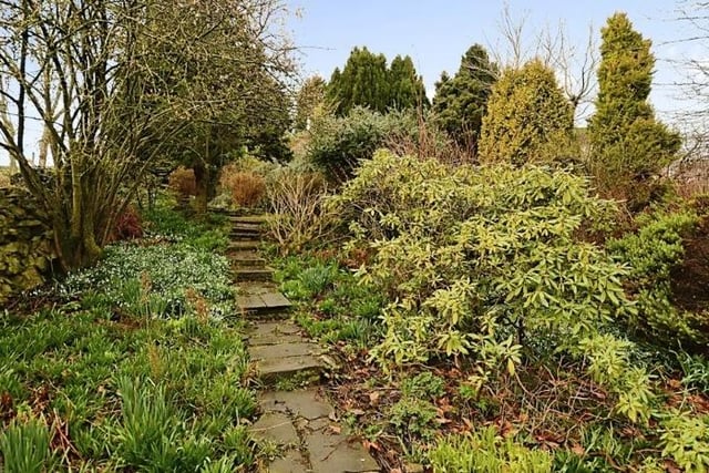 The rear garden offers plenty of areas to explore.