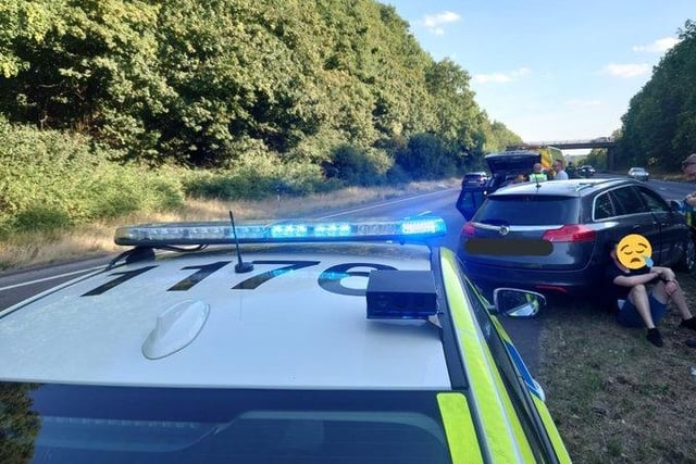 This driver was found with "tens of thousands of pounds" in his car boot after panicking when he saw police and crashing into the A38 central barrier. 
He was found to have no licence or insurance, having entered the UK illegally.
The male was arrested for money laundering, immigration and document offences.