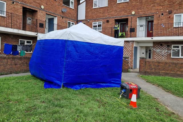 The property was cordoned off after officers found two bodies.