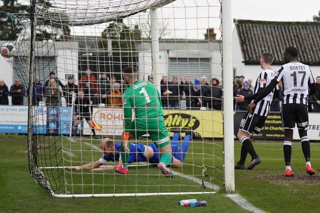 Tom Denton heads Chesterfield in front at Chorley.