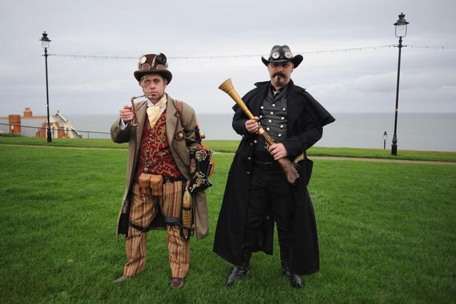 Chris Simpson(L), and Wayne Ellis, both from Chesterfield, visit the Goth weekend dressed as steampunks on November 2, 2013 in Whitby.