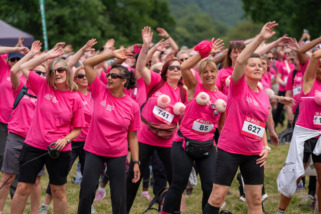 This photo taken during the warm-up exercises show how Pink Ribbon Walk participants accessorised their t-shirts Photo: Breast Cancer Now