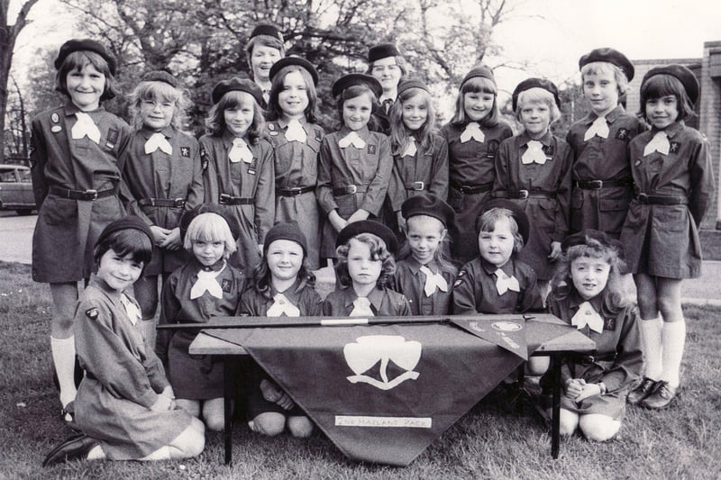 The presentation of the Pennant to the 2nd Hasland Brownies was held at the Hasland Youth Club. Our picture shows the pack with their pennant and leaders Mrs Janice Rodgers (left) and Mrs Mavis Harrison - May 4 1976