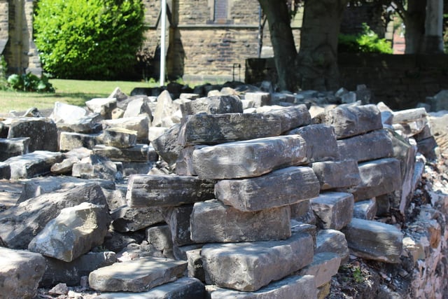 Intact brickwork and masonry was also put to one side, ready to be recycled and used to rebuild the wall.