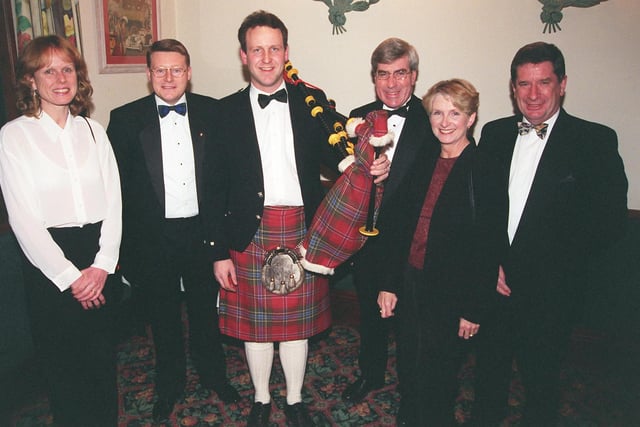 Pictured at Baldwin's Omega Restaurant, Psalter Lane, Sheffield, where the Royal Bank of Scotland held their Burn's Night Dinner in 2000. Seen are guests LtoR, Caroline Allison, Martin Allison, Piper Mr Chris Strong, John McGuire, Charlotte Gosling, and Keith Gosling.