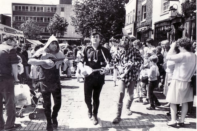 Wandering minstrels entertain the crowds at Chesterfield's Medieval Market in 1985