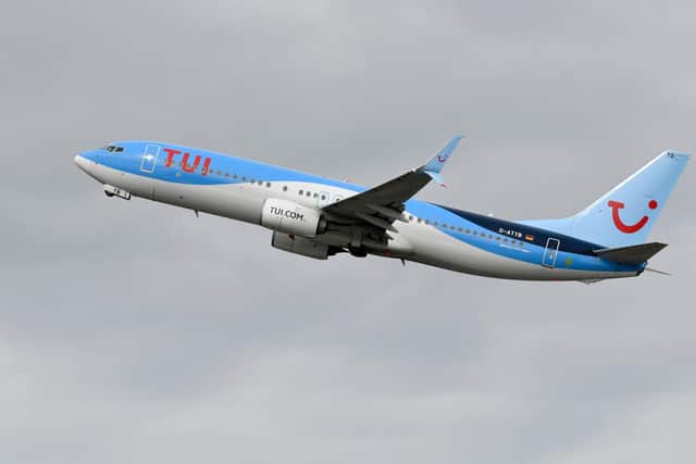 A spokesperson for TUI has commented after a plane delayed for over six hours was forced to ‘circle over Peak Distrcit’ - after one of the passengers refused to fasten her child's seatbelt. (Photo by INA FASSBENDER / AFP) (Photo by INA FASSBENDER/AFP via Getty Images)