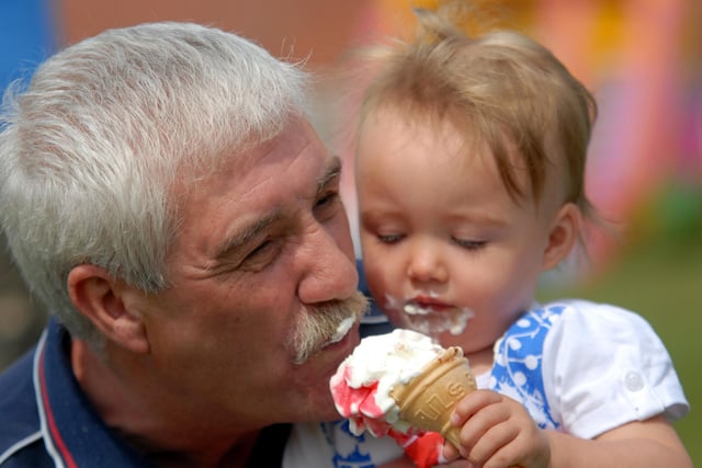 Grandfather David Proudlock shares an ice cream with granddaughter Grace Kennedy in this photo from 12 years ago.