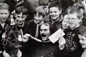 Ripley scout group Christmas fayre. The Bill Actor Kevin Lloyd is pictured with scouts.