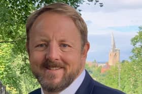 A woman is due to be sentenced by a judge after admitting threatening Chesterfield MP Toby Perkins with bogus allegations.