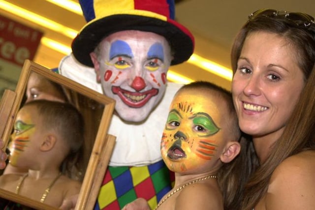 On August 12, 2000, there was an event at the Doncaster Frenchgate called Little Monsters. Here is Asha Forbes painted as a tiger with his mother Julie Bradley. Face painter is Simon Carr.