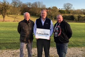 Brassington carnival Committee members Tim Pope, left, and Darren Rippon, right, with Longcliffe Group managing director Paul Boustead.