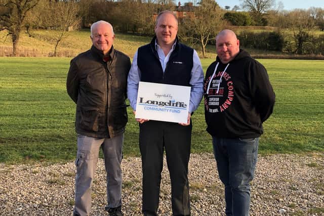 Brassington carnival Committee members Tim Pope, left, and Darren Rippon, right, with Longcliffe Group managing director Paul Boustead.